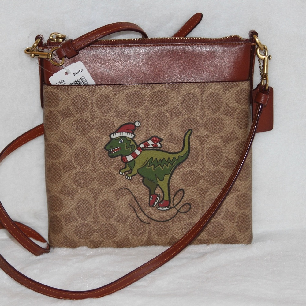 NWT COACH Kitt Messenger In Signature Canvas With Rexy Ice Skating
